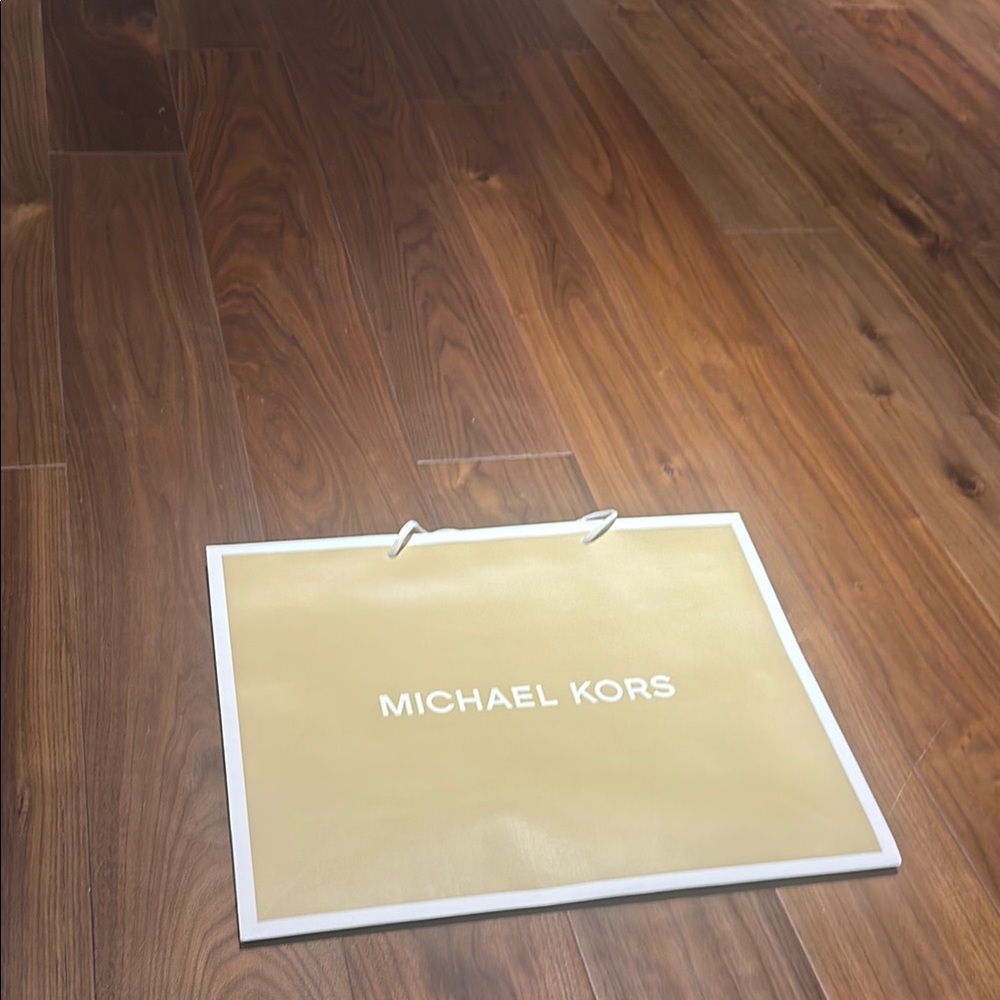 Medium sized Michael Kors bag.
